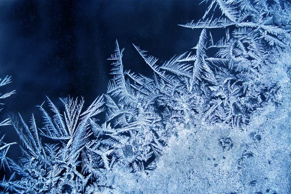 Modèle de givre sur la fenêtre Photo De Stock