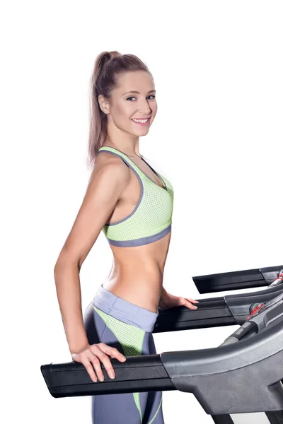 Fitness woman running on treadmill in gym — Stock Photo, Image