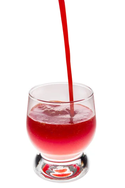 Hälla ett glas tomatjuice — Stockfoto