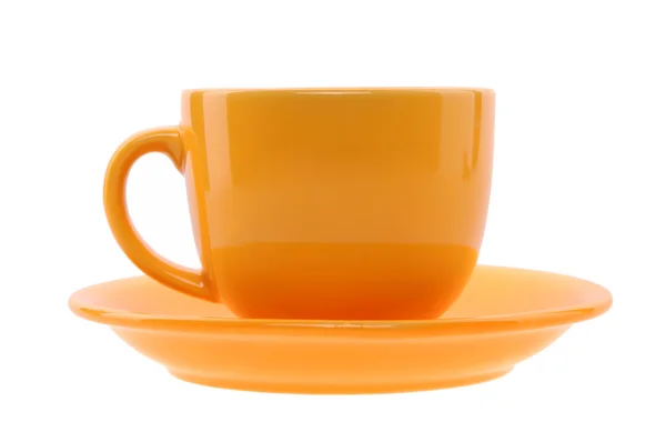 Orange cup and saucer — Stock Photo, Image