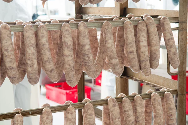 Sausage hanging in the warehouse — Stock Photo, Image