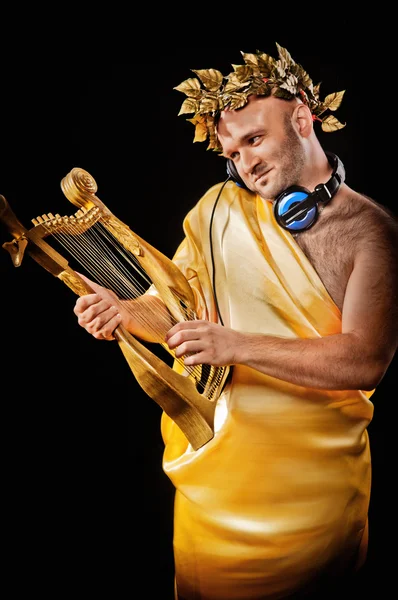 Człowiek z harfa — Zdjęcie stockowe