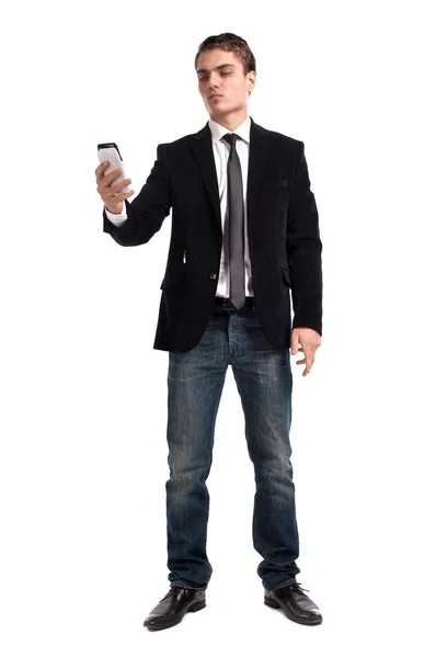 Young happy man holding mobile phone — Stock Photo, Image