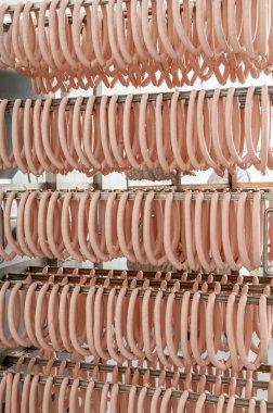 sausage hanging in the warehouse clipart