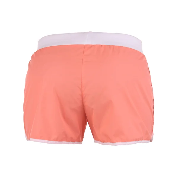 Pantalones cortos de color naranja sobre fondo blanco — Foto de Stock