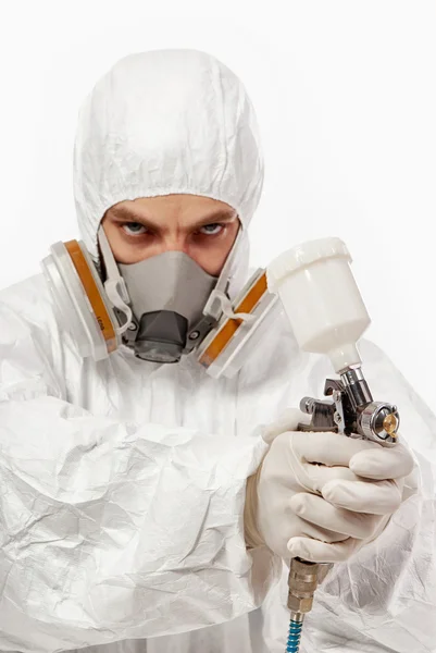 Worker with airbrush gun — Stock Photo, Image