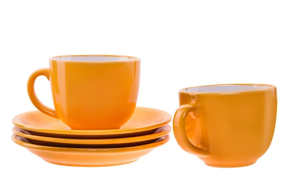 Orange Tasse und Untertasse — Stockfoto