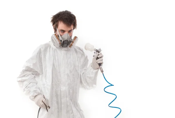 Worker with airbrush gun — Stock Photo, Image