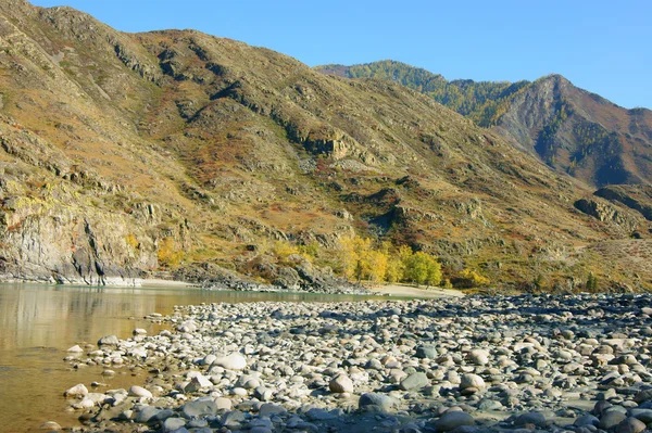 Stony riverside in mountain — Stock Photo, Image