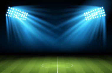Sahne ışıkları ile futbol arena.