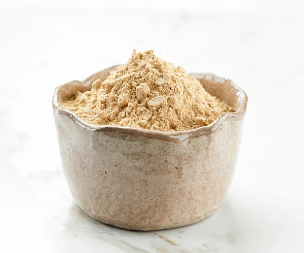 Bowl of maca powder — Stock Photo, Image