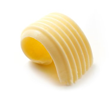beyaz zemin üzerine tereyağı curl