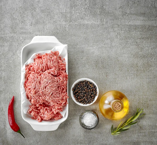 Ground pork and various spices — Stock Photo, Image