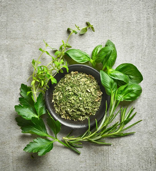 Bowl of dried herbs — Stock Photo, Image