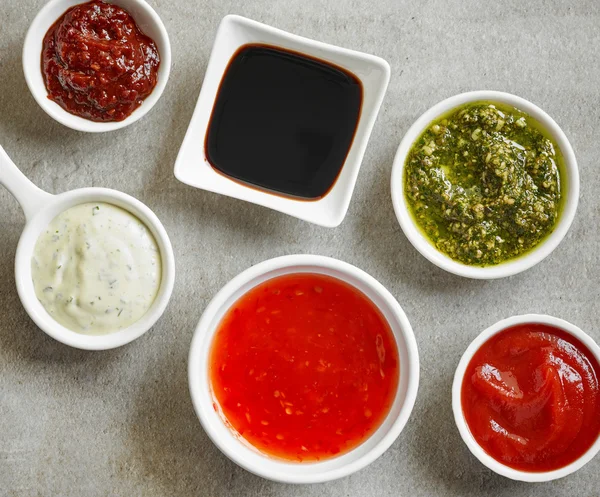 Bowls of various sauces — Stock Photo, Image