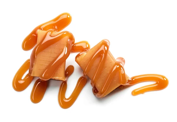 Caramel candies on white background — Stock Photo, Image