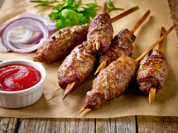 Grilled minced meat skewers — Stock Photo, Image