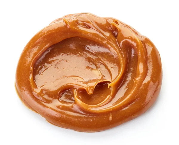 Caramel topit pe fundal alb — Fotografie, imagine de stoc