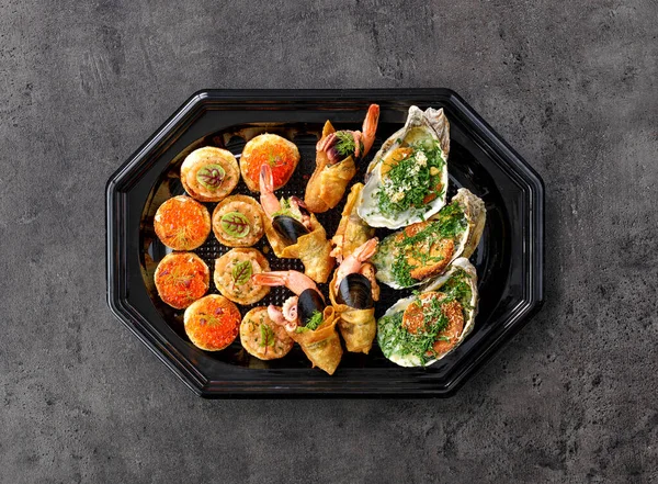 Plate Various Seafood Snacks Grey Table Top View — Stock Photo, Image
