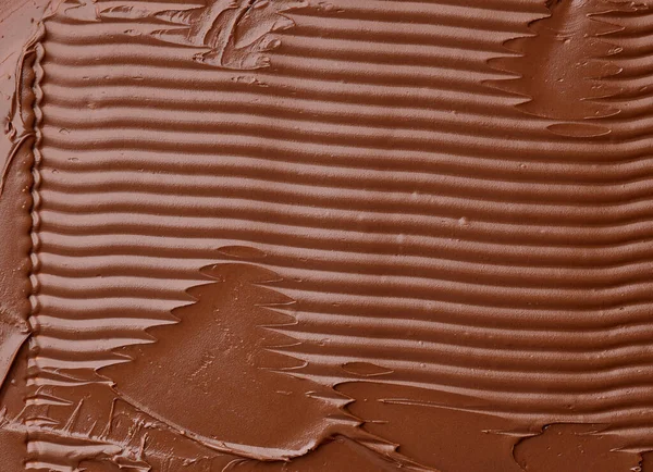 melted chocolate cream  background, top view