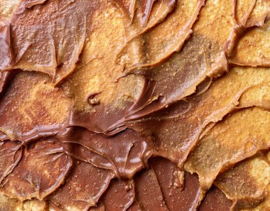 Çikolatalı fındıklı krema ve fıstık ezmesi arkaplan.