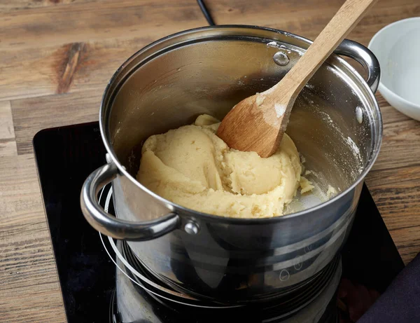 Process Making Dough Eclairs Cream Puffs Pot Dough Electric Induction — Stock Photo, Image