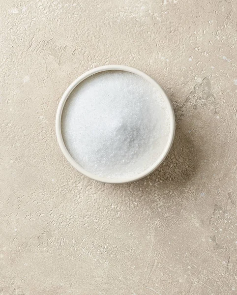 Miska Cukru Białego Beżowym Tle Tabeli Kolor Widok Góry — Zdjęcie stockowe