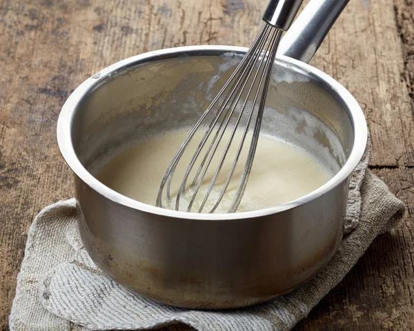 Making vanilla sauce — Stock Photo, Image