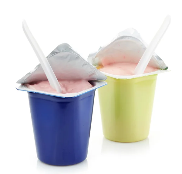 Due vasetti di plastica yogurt — Foto Stock