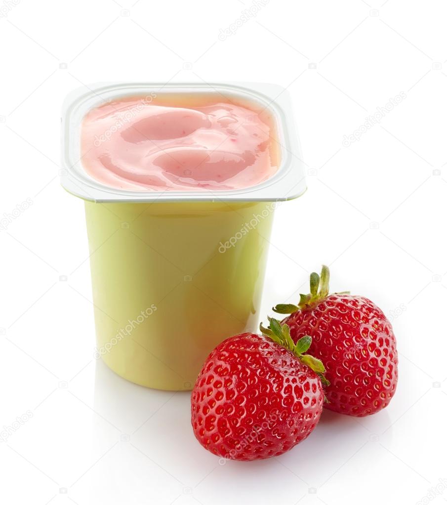 fresh pink strawberry yogurt in plastic pot