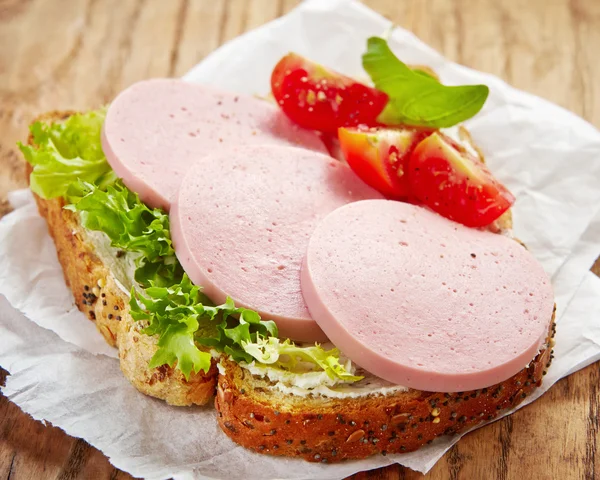 Sandwich with sliced sausage — Stock Photo, Image