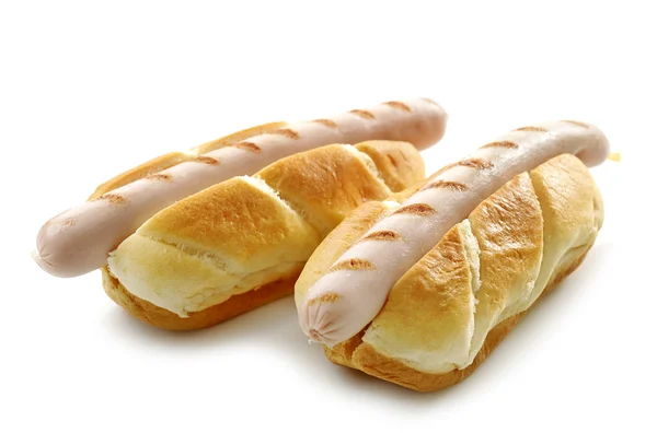Дві хлібні булочки з смаженими ковбасками — стокове фото
