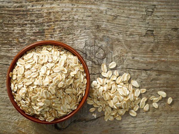 Bowl of oat flakes — Stock Photo, Image