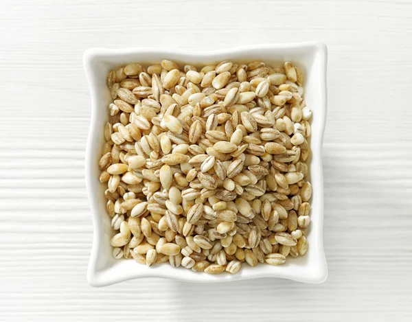 Tazón de granos de cebada perla —  Fotos de Stock