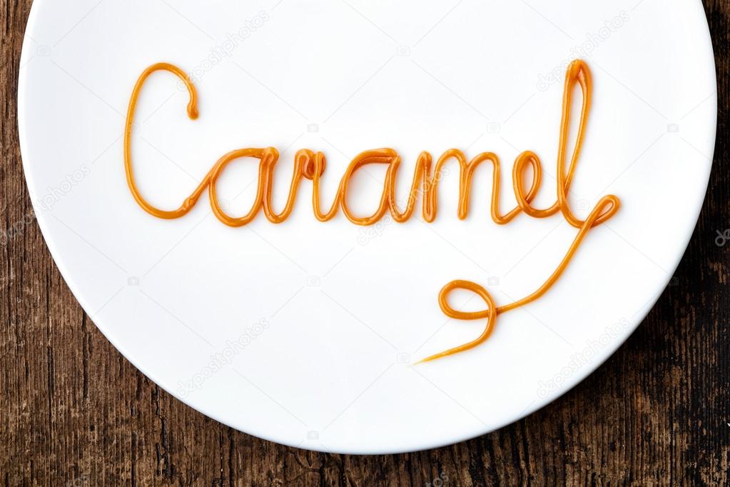 Word Caramel on white plate