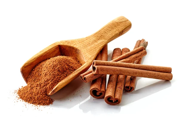 Cinnamon ground and sticks — Stock Photo, Image