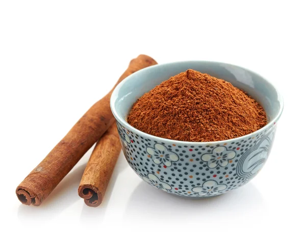 Bowl of cinnamon powder — Stock Photo, Image
