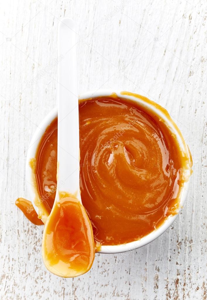 bowl of homemade caramel sauce