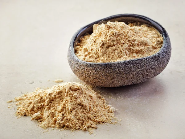 Bowl of maca powder — Stock Photo, Image