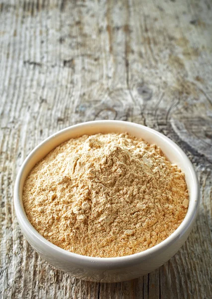 Bowl of maca powder — Stock Photo, Image