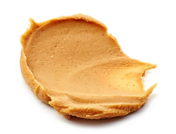 Erdnussbutter-Aufstrich isoliert auf weiß — Stockfoto