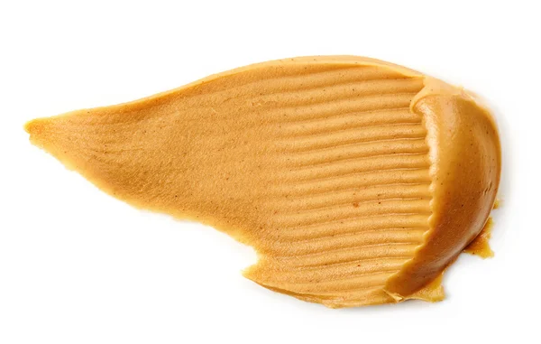 Arašídové máslo šíří izolované na bílém — Stock fotografie