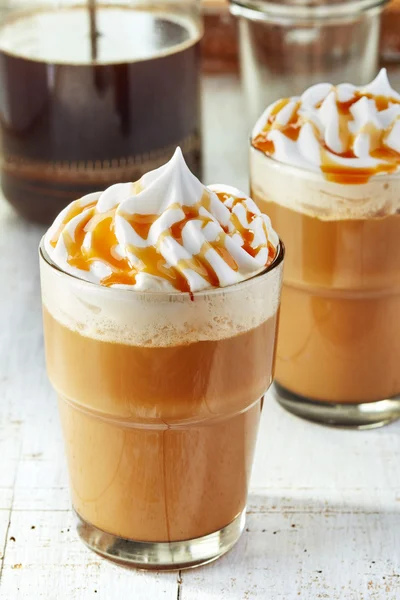 Two glasses of coffee with whipped cream — Stock Photo, Image