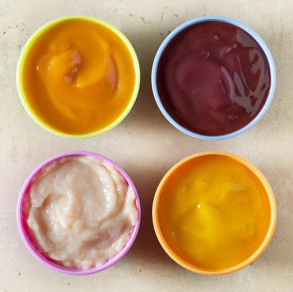 Various kinds of baby food — Stock Photo, Image