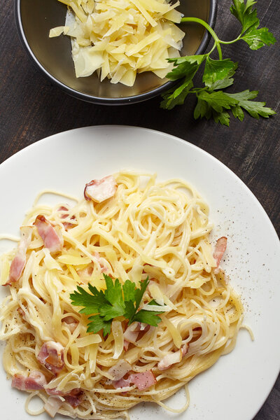 pasta carbonara on white plate