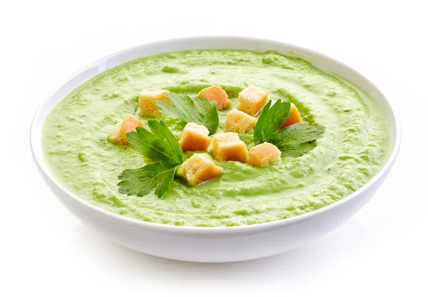 Misku polévky brokolice a zelené hrachové lusky, smetana — Stock fotografie