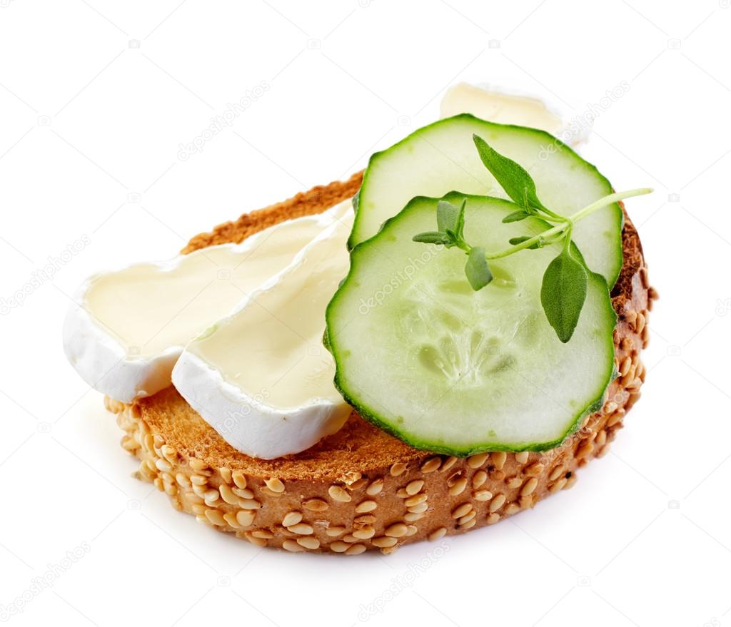 Toasted bread with brie and cucumber Stock Photo by ©magone 85380118