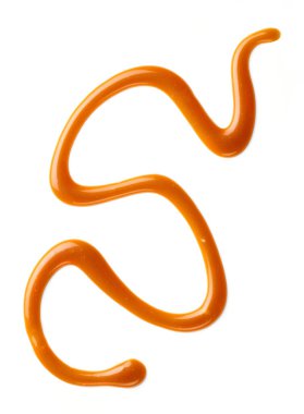 Beyaz arkaplanda izole edilmiş karamel sosu, üst görünüm