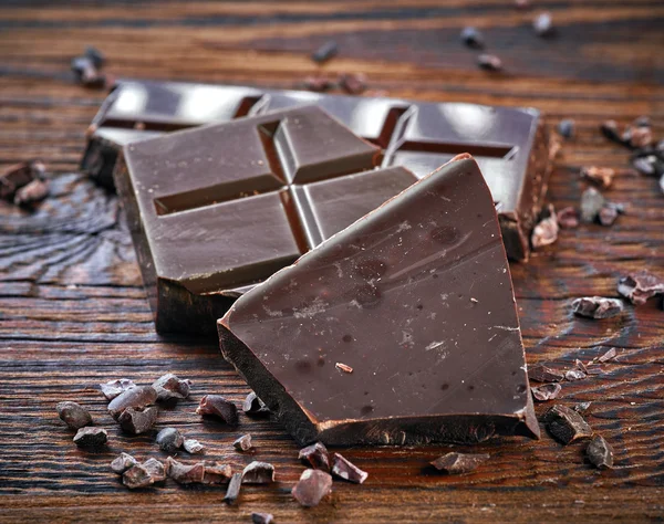 Pieces of natural dark chocolate — Stock Photo, Image