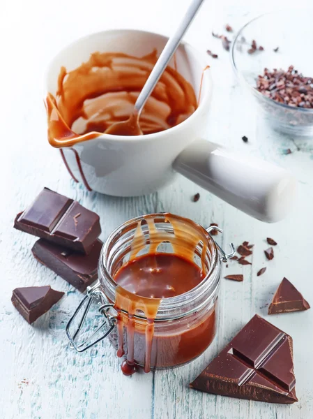 Jar of chocolate sauce — Stock Photo, Image